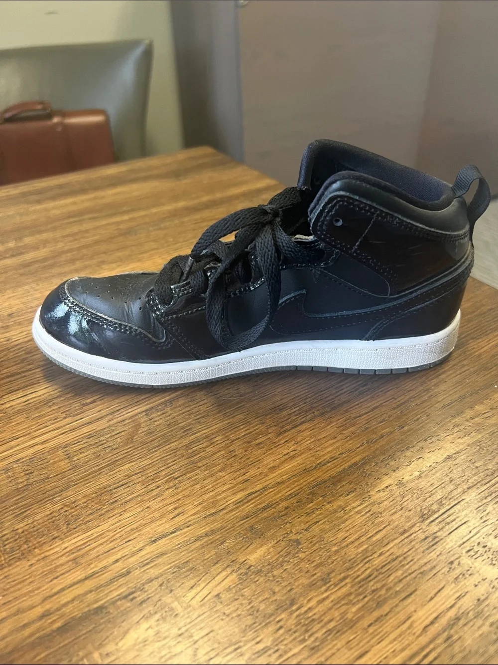 Black Nike High-Top Sneakers with White Sole - size 3